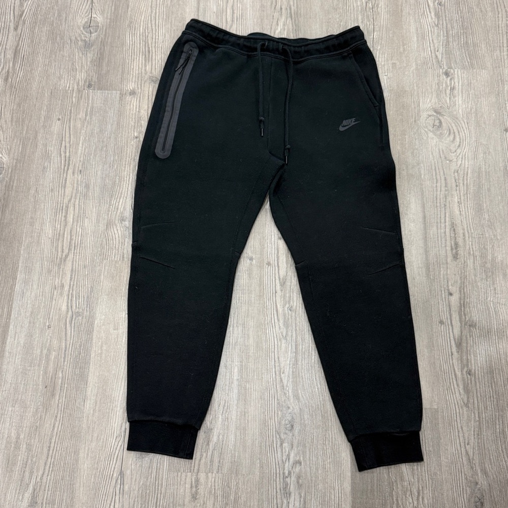 Nike Tech Black Jogger Pants with Zipper Detail